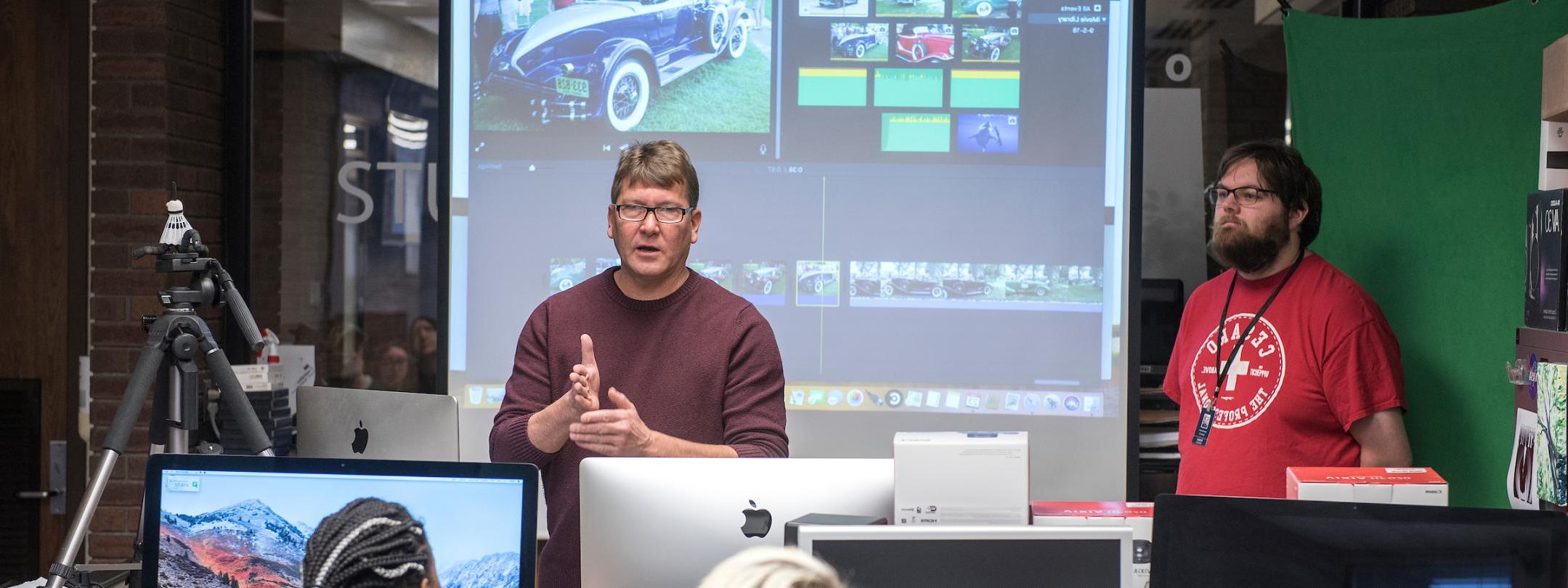 Instructor giving a lecture in Studio M.